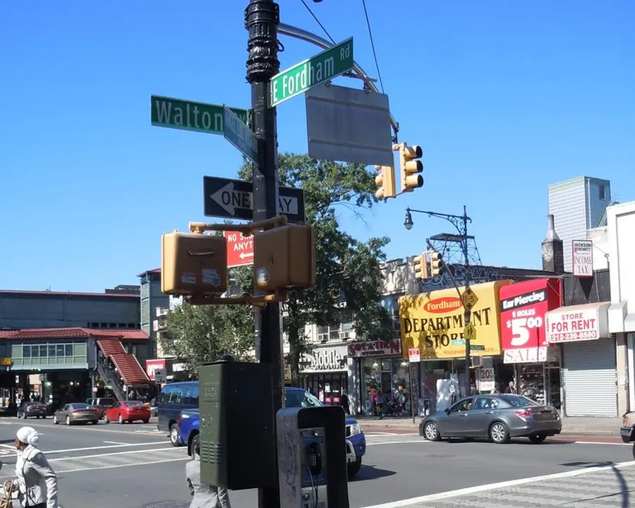 The corner of East Fordham Road and Walton Avenue, with the elevated 4 train station behind